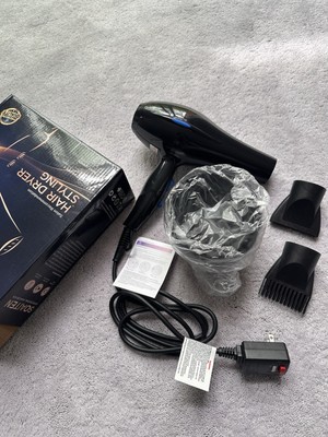 Hair dryer with hot and cold air functions and multiple accessories
