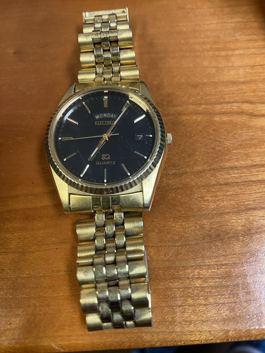 Vtg Seiko SQ Men 5Y23-8A69 36mm Gold Tone Black Dial DayDate