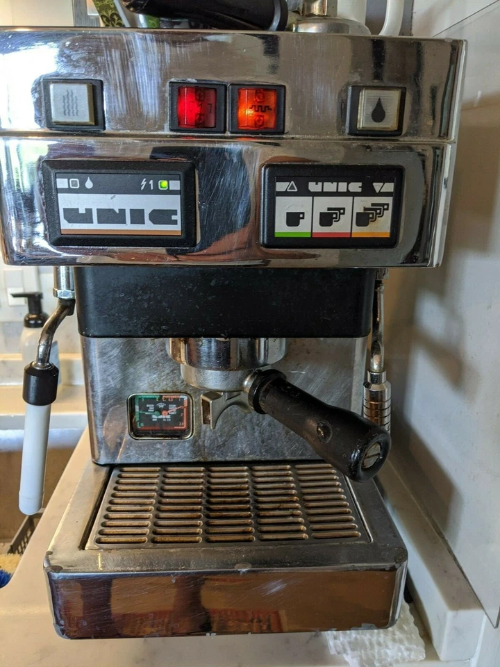 used commercial espresso machine, includes professional labor installation.