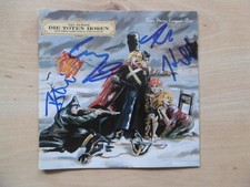 Die Toten Hosen autographs signed CD booklet "On the Crusade into happiness"