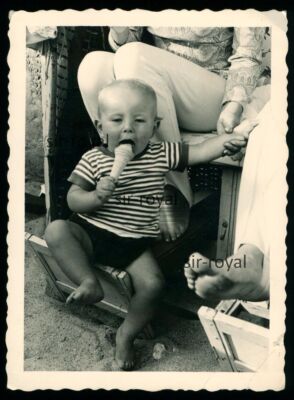 Toddler licking an ice cream and looking a little silly - Photo 7x10cm