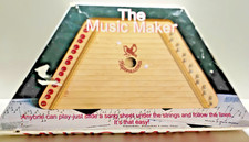 THE MUSIC MAKER, BY EUROPEAN EXPRESSIONS, WITH SHEET MUSIC   NIB!           (C3