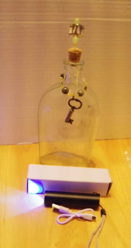 Vintage bottle w/ uranium and yooperlite accents & vintage clock key & UV light