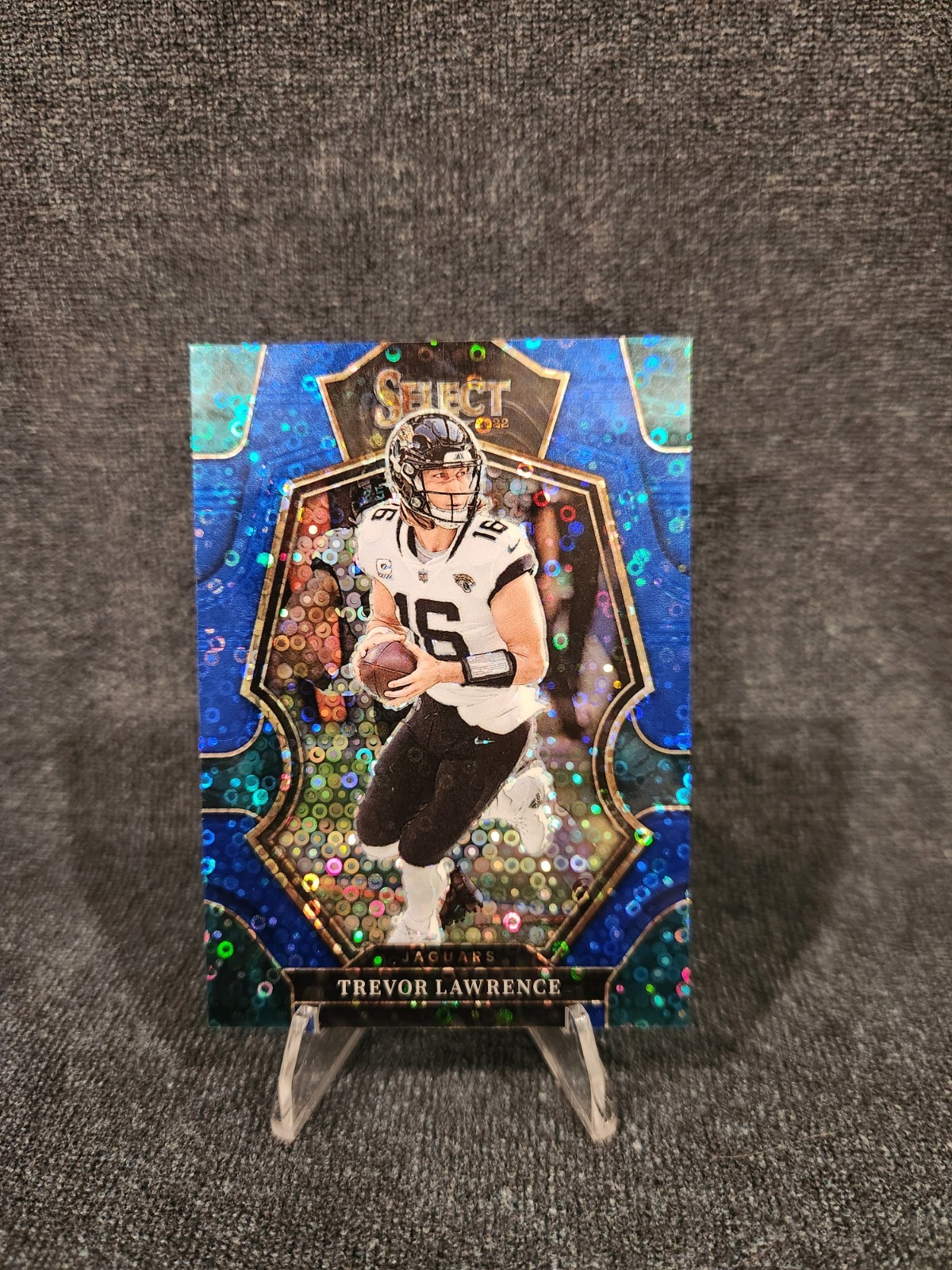2022 Panini Select Premier Level Blue Disco Prizm /25 Trevor Lawrence #145