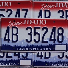 IDAHO LICENSE PLATES - Scenic Idaho Famous Potatoes Graphic License Plate Tags