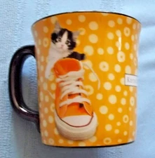 Keith Kimberlin Kitten in yellow Chucks sneaker mug The Encore Group