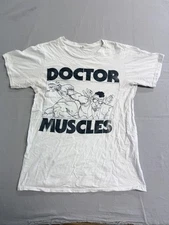Thrashed Doctor Muscles Comic Strip T-shirt Fist Head