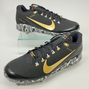 black and gold nike baseball cleats