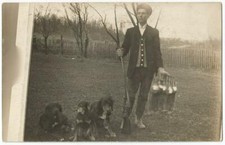 Rabbit Hunter With Shotgun & Hunting Dogs RPPC Real Photo Postcard c.1910