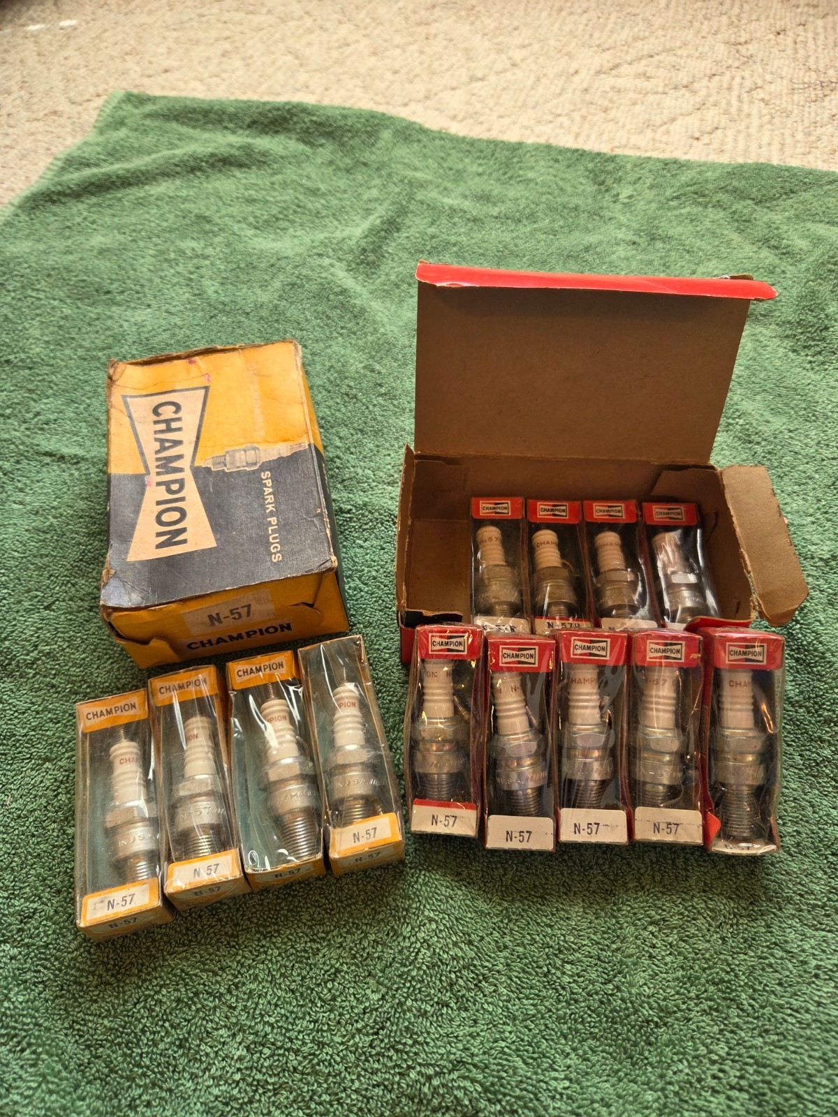 Vintage champion spark plugs new in boxes 9 N-57 and 4 N-57R
