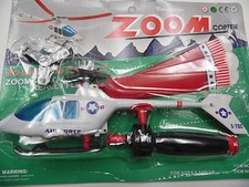 ZOOM COPTER - Flies Over 100 FT. No Batteries Needed  NIP
