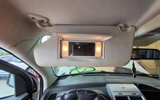 DODGE JOURNEY 2009-2010 LEFT SUN VISOR WITH ILLUMINATION 1691637