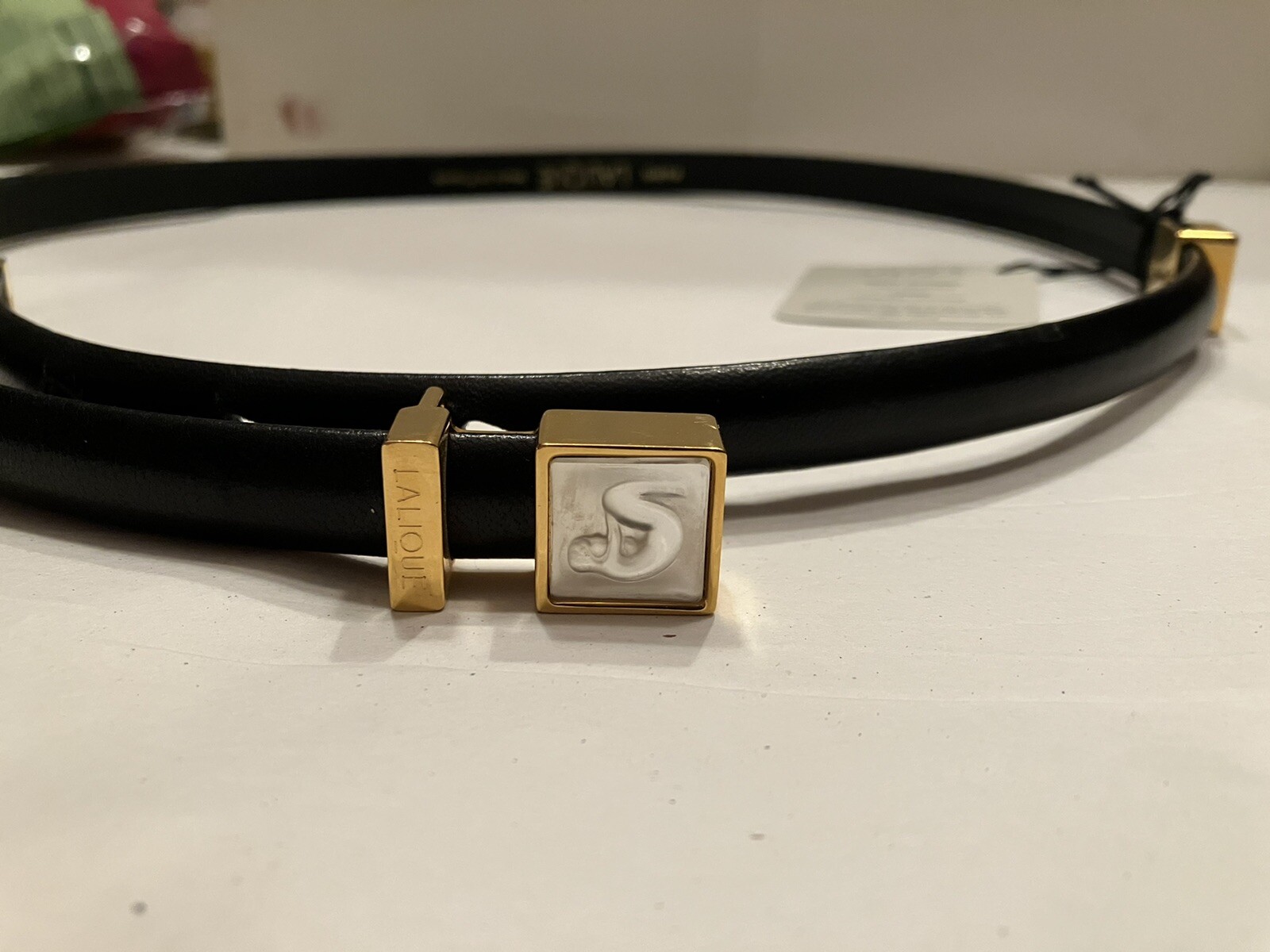 Lalique black leather ladies 'Venus' belt w/ gold metal and crystals