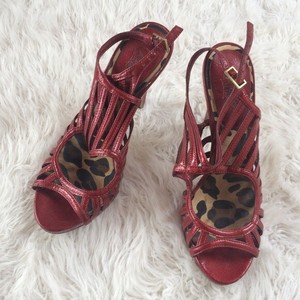 carlos santana red heels