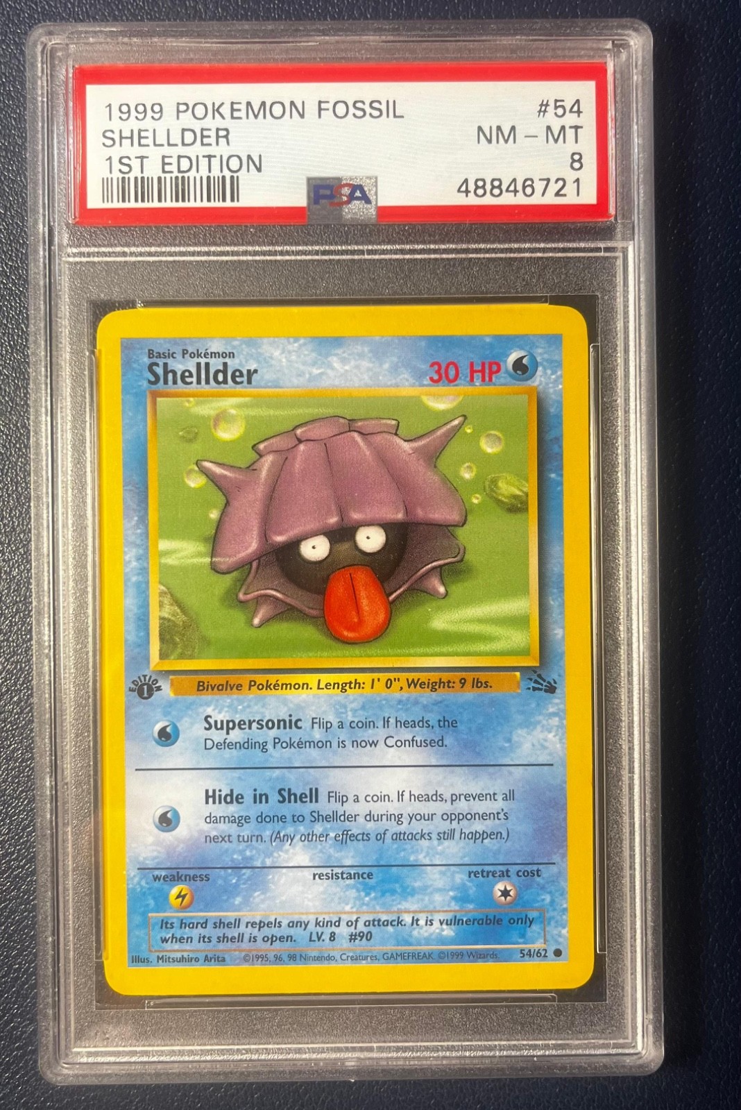 First Edition 1999 Pokemon Fossil 54/62 Shellder PSA NM-MT 8