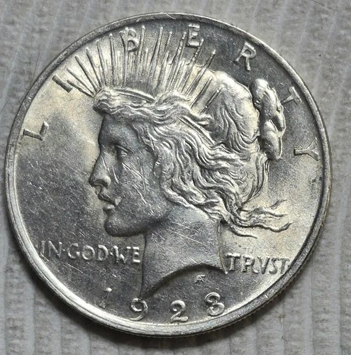 1923 P Peace Silver Dollar. Estimated Almost Uncirculated 58. A0938.