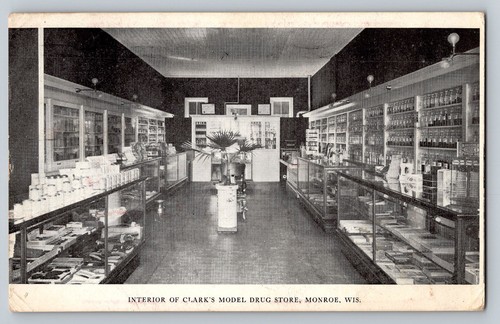 1909 Monroe Wisconsin Clarks's Drug Store Postcard