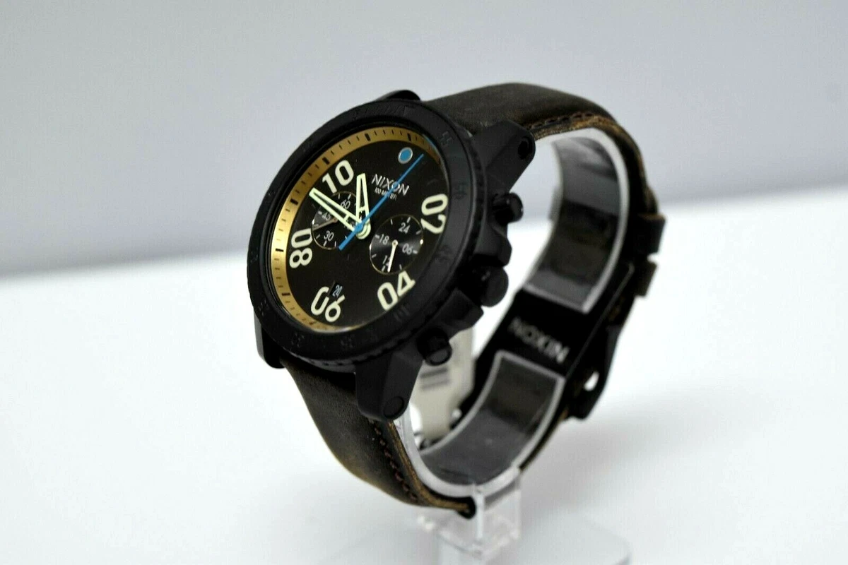 Nixon brass shop watch