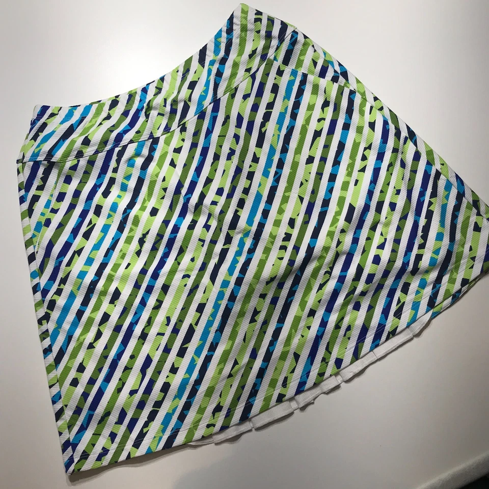 Falda corta Tail Tech azul blanco verde a rayas bolsillos deportivos dobladillo plisado talla S Foto 3 de 4