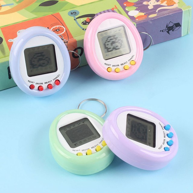 168 Pets in One LCD Display Electronic Digital Pet Game Console Keychain Vintage 168 Pets in One LCD Display Electronic Digital Pet Game Console Keychain Vintage