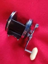 PENN SURFMASTER 100 WITH NEWELL Base,Clamp,Spool and Braces, Serviced.