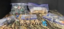Mixed Lot Of Plastic Army Men And Army Action Figures Seperated In Bags + Zombie