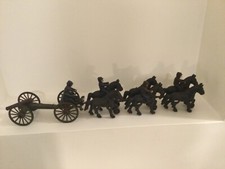Vintage cast iron civil war caisson with horses, riders and cannon