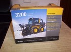 ERTL JOHN DEERE 320D SKIDSTEER - NIB — photo 4