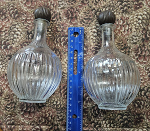 2- 5" high Clear Class bottles with wooden and plastic stoppers