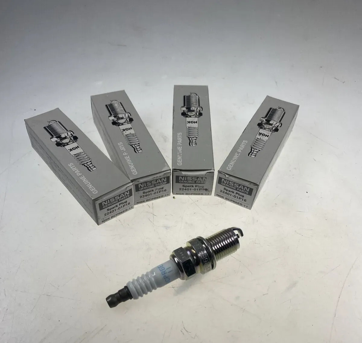 4 Original Nissan spark plugs 22401-01P16 for Ford ,Lada ,Nissan