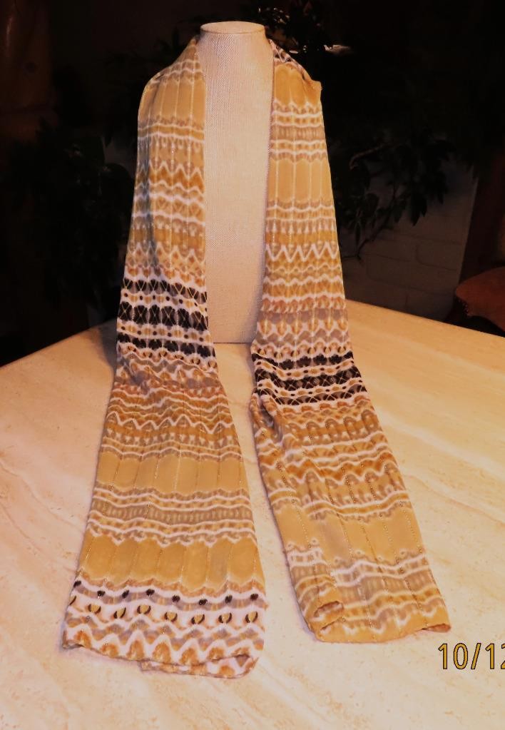 Echo oblong scarf; abstract; tan white black; metallic accents; poly; 72x20 in.