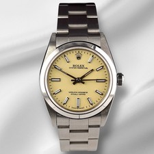 Montre Rolex Oyster Perpetual 31Mm Acier Inoxydable Cadran Beige Ref 67480