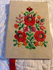 Lush embroidered book cover with satin lining and book marker