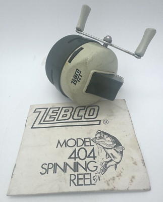 VINTAGE ZEBCO MODEL 404 SPINNING REEL FISHING REEL WITH BROCHERE
