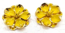 1960s boho/hippie yellow flower power earrings. Enameled gold-tone metal
