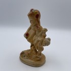 Vintage Chalkware Girl Holding Doll