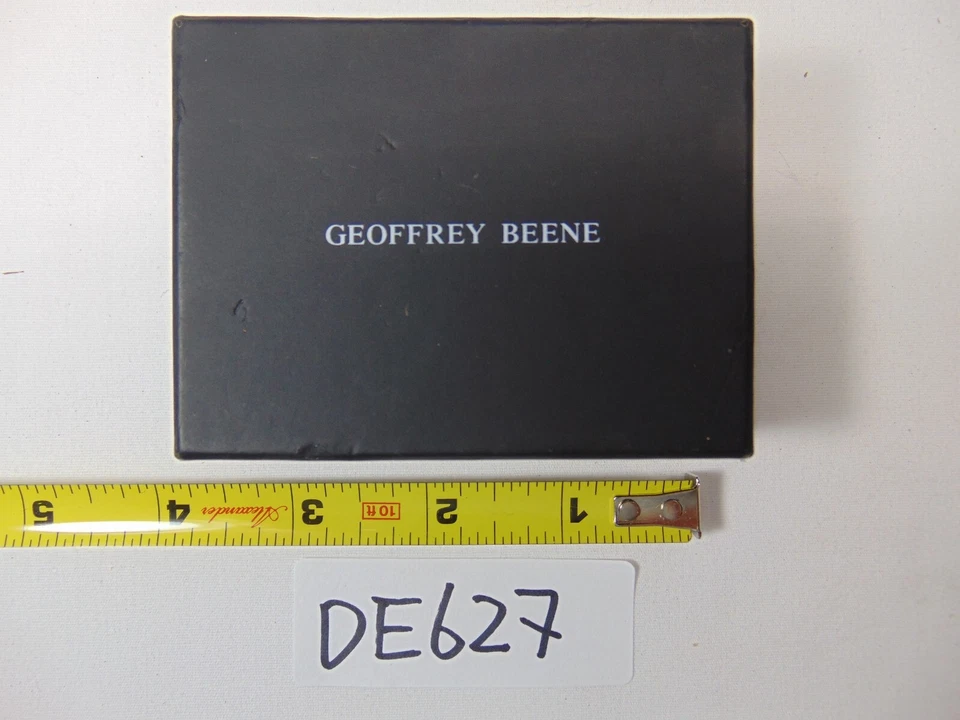 Gemelos Geoffrey Beene tono plateado y negro a rayas rojas y negras Foto 2 de 4