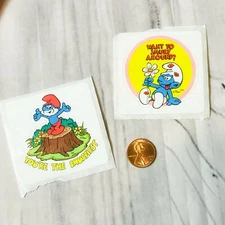 Lot Of 2 Vintage SMURF Stickers Peyo Wanna Smurf Around & Papa Smurfiest