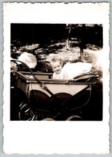 Vtg B&W Snapshot Smiling Baby In Pram Outdoors 1949