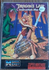 Dragon's Lair SNES game and manual with tray, oem dust cover, and protector