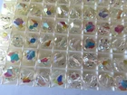 24 Swarovski vintage (retired cut) round tapered end bead 10mm Crystal AB. #5300