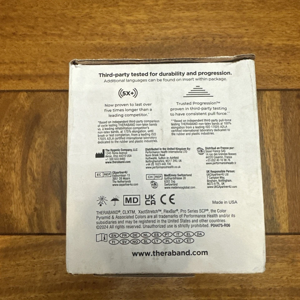 Banda de ejercicio roja mediana de 25 yardas sin látex para entrenamiento de resistencia y rehabilitación Foto 4 de 4