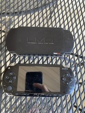 Sony PSP-1001 PlayStation Portable - Black With 7 UMD Games