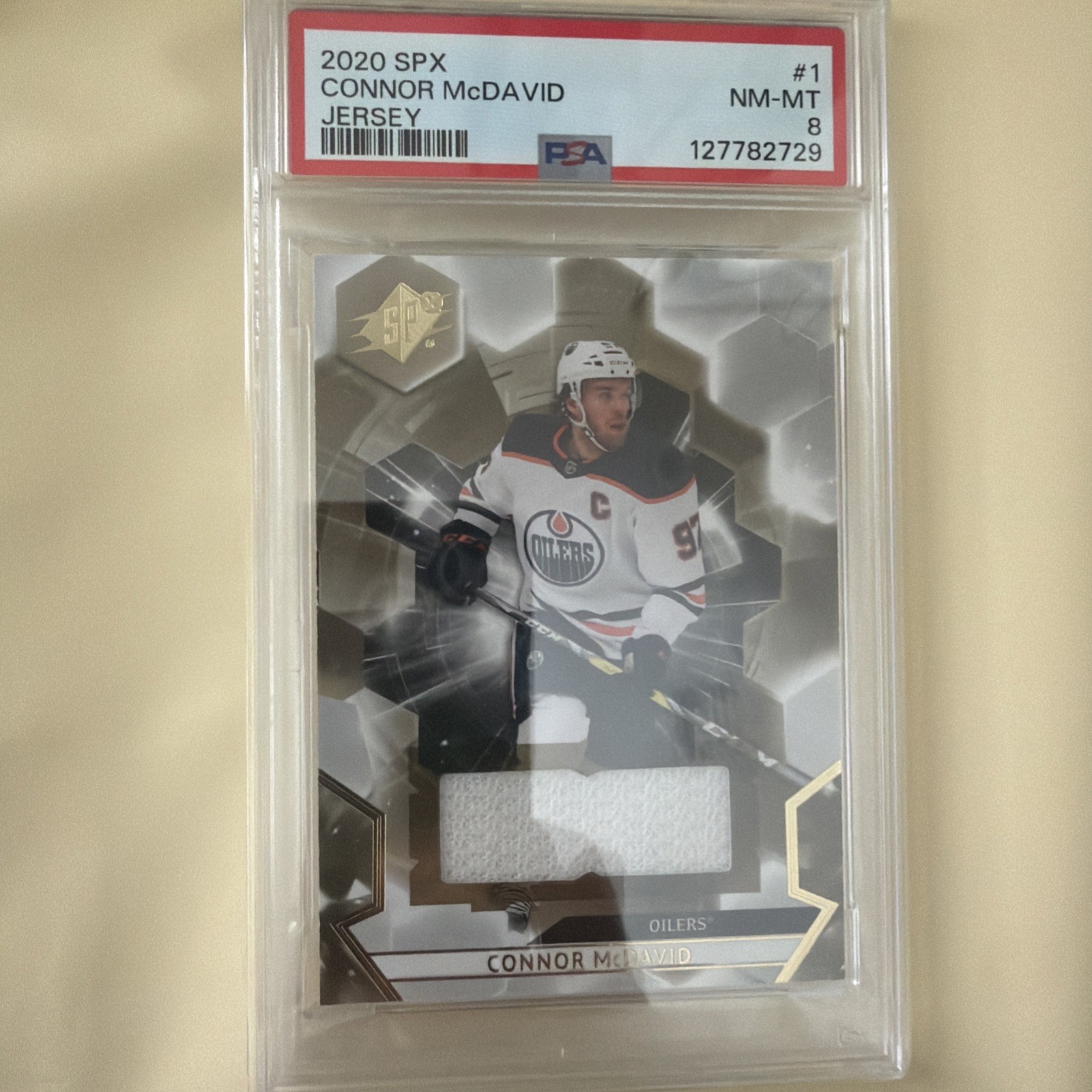 2020-21 Upper Deck SPx Connor McDavid #1 Jersey Memorabilia PSA 8