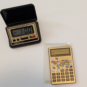 Vintage Seiko EK452G World Time Rate Exchanger And Spartus Quartz Alarm Clock
