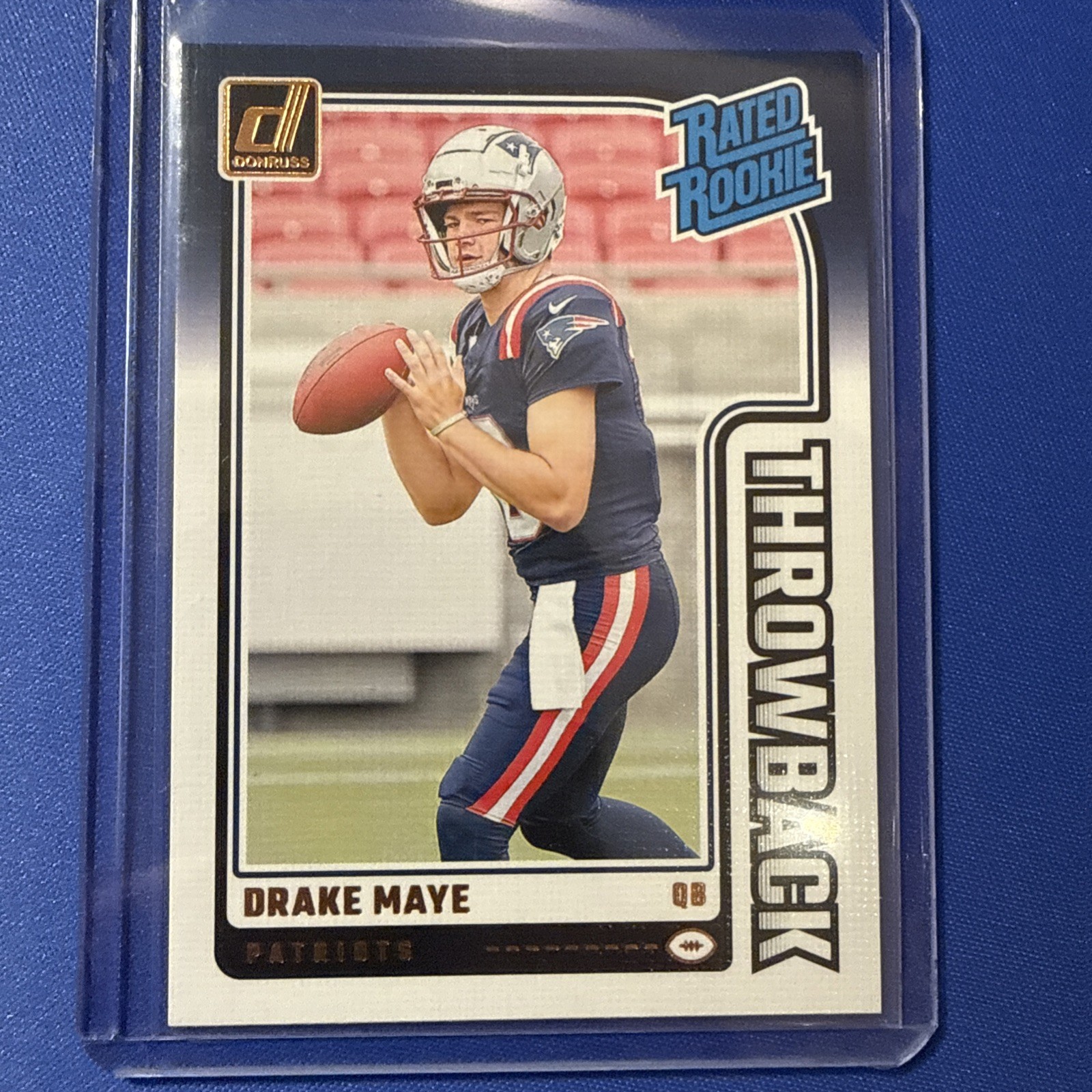 Drake Maye #49 (Football Cards 2024 Panini Donruss Rated Rookie Throwback) — is it worth grading?