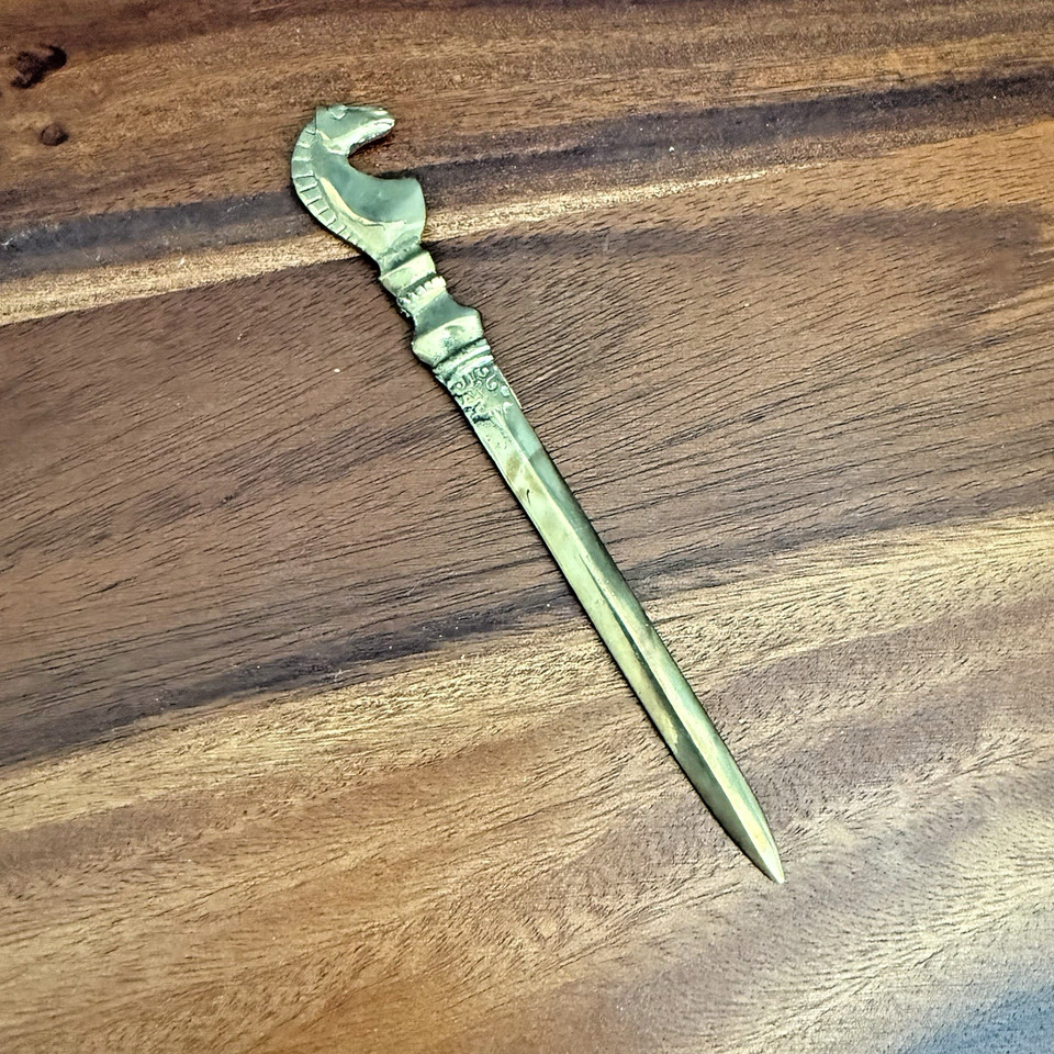 A solid brass figural horse letter opener with polo/equestrian detailing — the kind of heirloom desk piece that belongs in a leather-and-mahogany study.