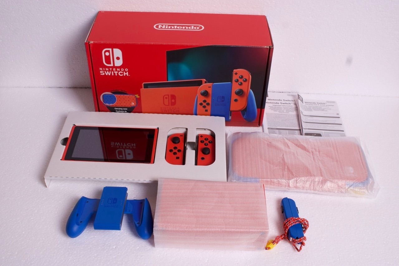 Nintendo Switch Limited Mario Red & Blue edition COMPLETO CIB Ottime condizioni