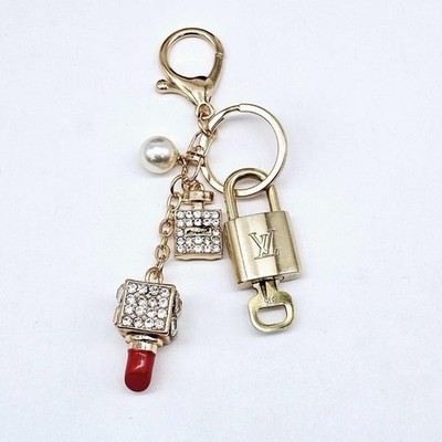 Authentic Louis Vuitton Lock & Key w/ Unbranded Bagcharm, Keychain