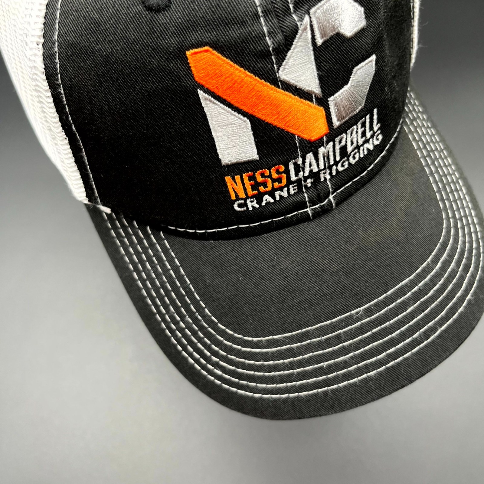 Ness Campbell Crane & Rigging Hat Platinum Mens One Size Black Trucker Cap Mesh